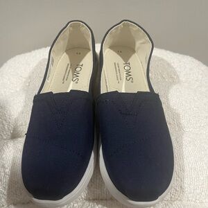 Tom’s Navy blue slip on